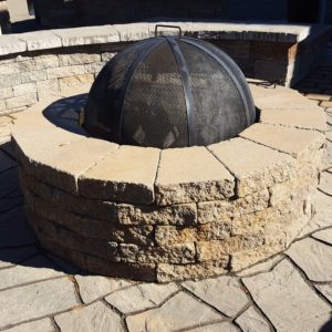 Fire pit kit made from cast concrete block